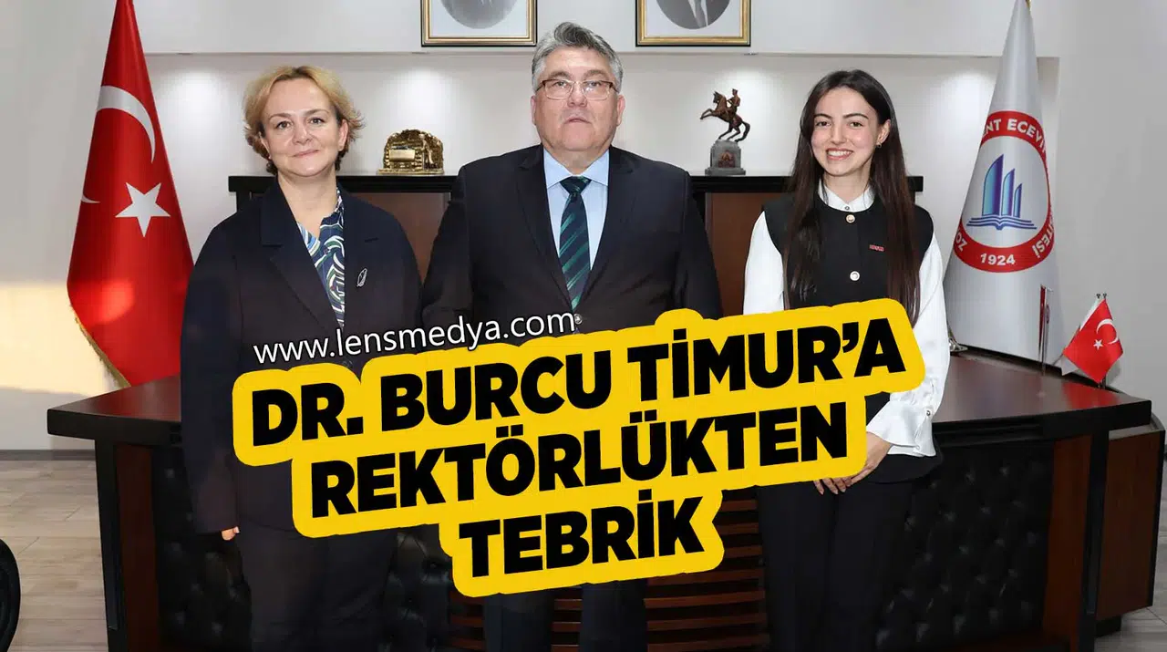 Rektör Özölçer, Yılın Doktora Tezi Ödülü'nü kazanan Dr. Timur'u makamında kabul etti
