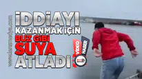 İddiayı kazanmak için buz gibi suya atladı!