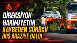DİREKSİYON HÂKİMİYETİNİ KAYBEDEN SÜRÜCÜ BOŞ ARAZİYE GİRDİ