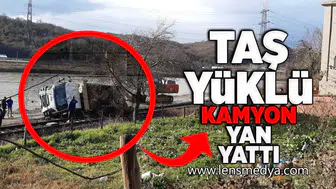 Taş yüklü kamyon yan yattı!