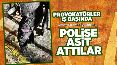 Provokatörler iş başında... Polise asit attılar!