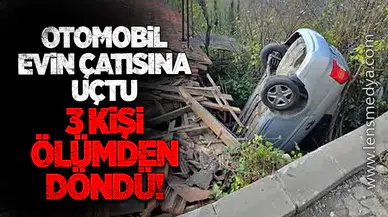 Otomobil evin çatısına uçtu... 3 yaralı!