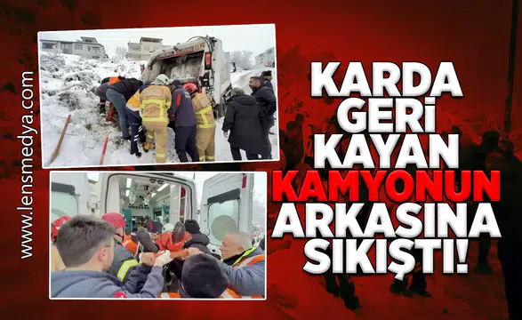 Karda geri kayan çöp kamyonun arkasına sıkıştı!