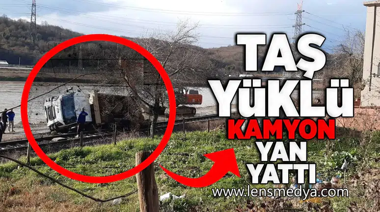 Taş yüklü kamyon yan yattı!